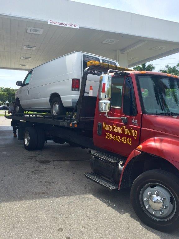 Marco Island towing company truck at shell